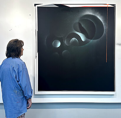 Nola Zirin with her painting entitled Lightwaves, 2025. Nola Zirin with her painting entitled Lightwaves, 2025.